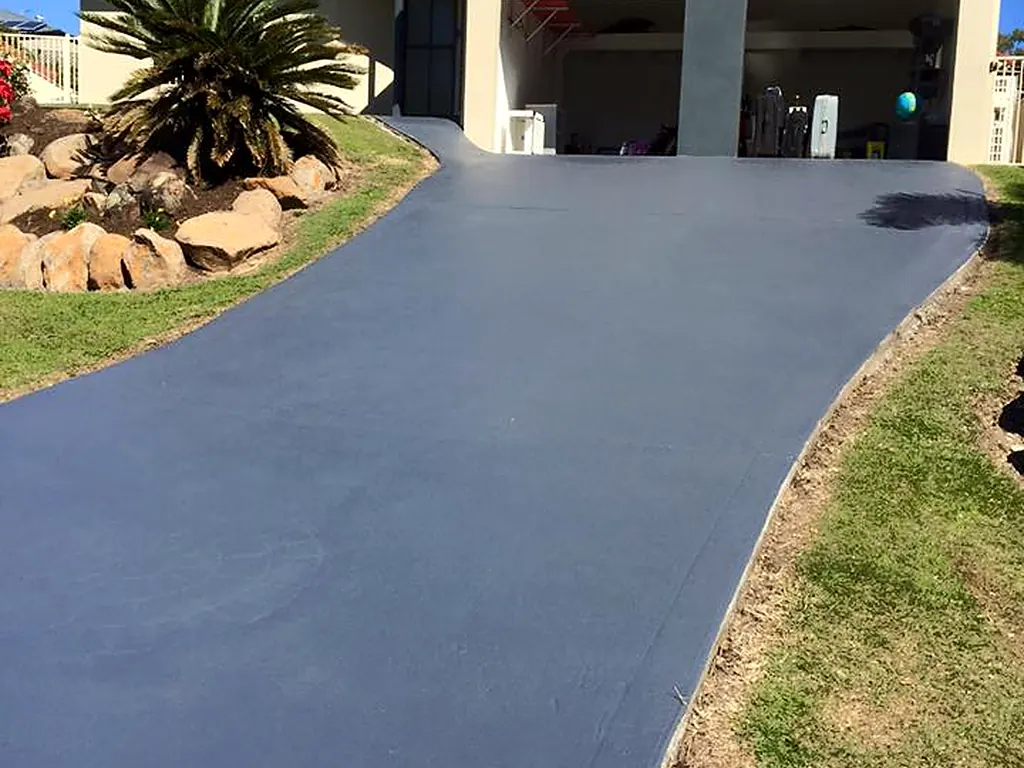 Concrete driveway with a fresh, even painted finish